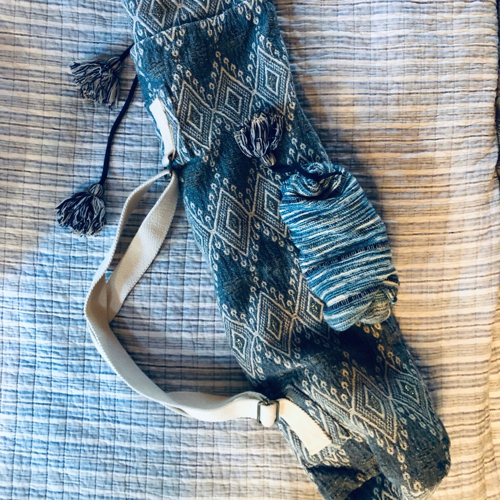 Yoga bag with water bottle holder strap and side pocket